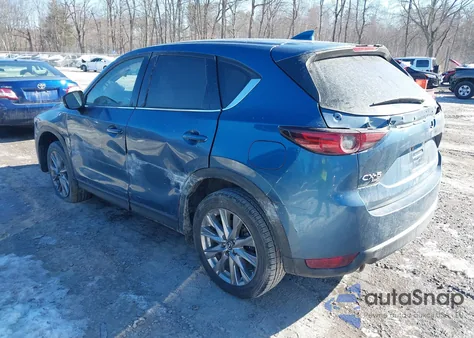 2021 Mazda Cx-5 Grand Touring z USA, uszkodzony, nr VIN JM3KFBDM2M0430626